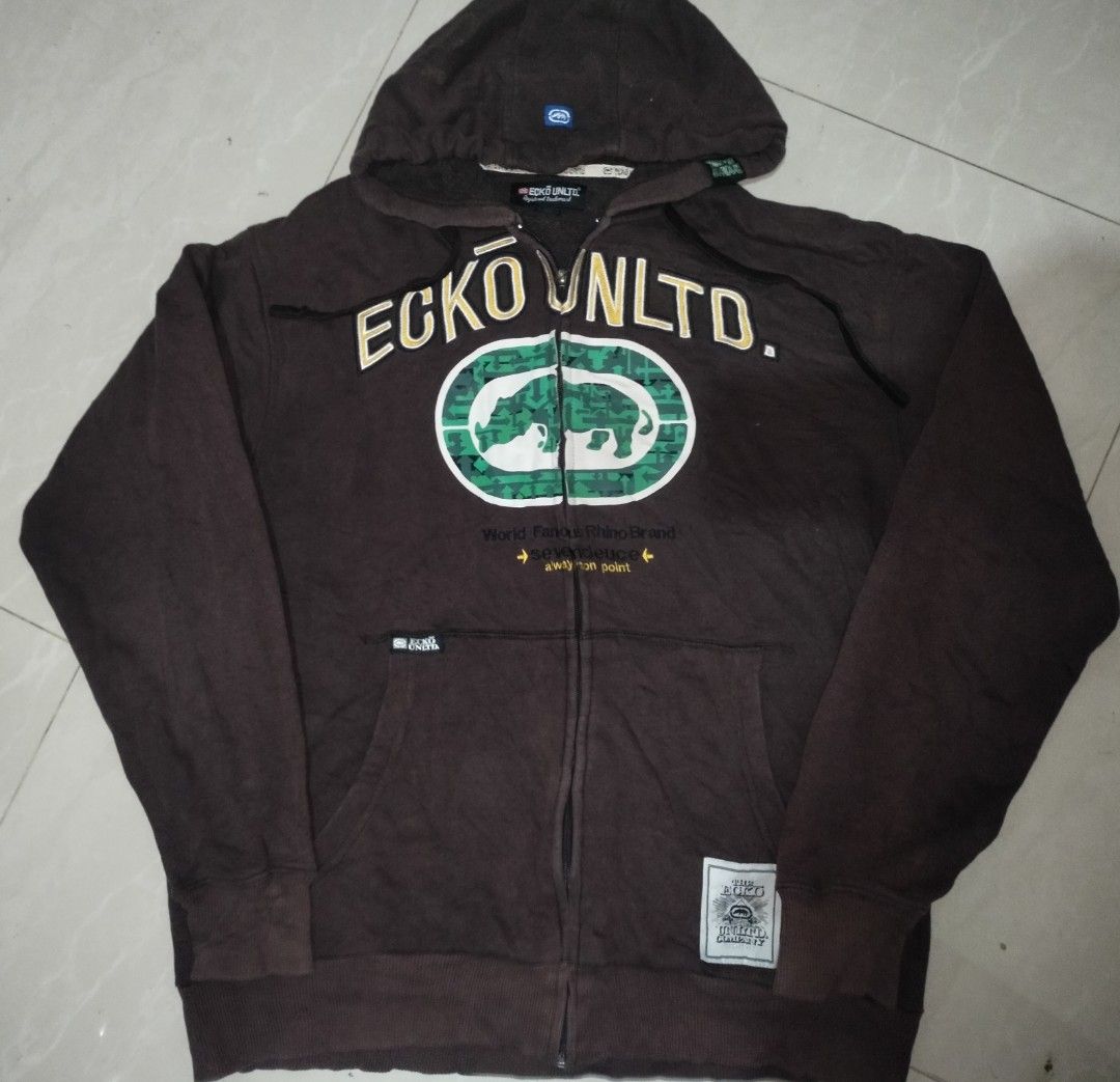 Ecko Unltd. Brown Zip-Up Hoodie (Category: Activewear) located in Jolo. Submitted by zah-zah (Listing ID 1446708252, Image 1). Description: - Brand: Ecko Unltd. - Color: Brown - Type: Zip-up Hoodie - Size: Large (L) - Features: Classic Ecko rhino logo on the front - Style: Great for casual wear - Condition: Check tag details for more information.