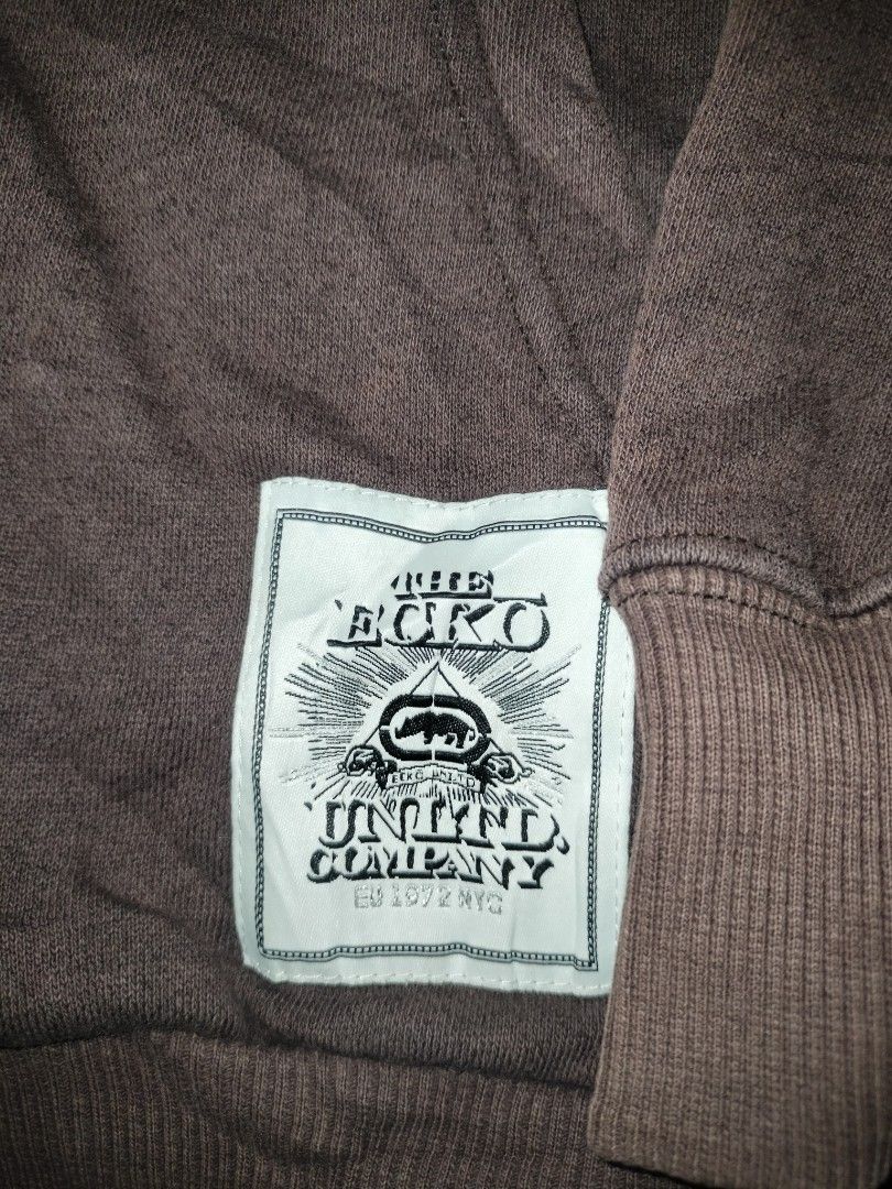 Ecko Unltd. Brown Zip-Up Hoodie (Category: Activewear) located in Jolo. Submitted by zah-zah (Listing ID 1446708252, Image 3). Description: - Brand: Ecko Unltd. - Color: Brown - Type: Zip-up Hoodie - Size: Large (L) - Features: Classic Ecko rhino logo on the front - Style: Great for casual wear - Condition: Check tag details for more information.