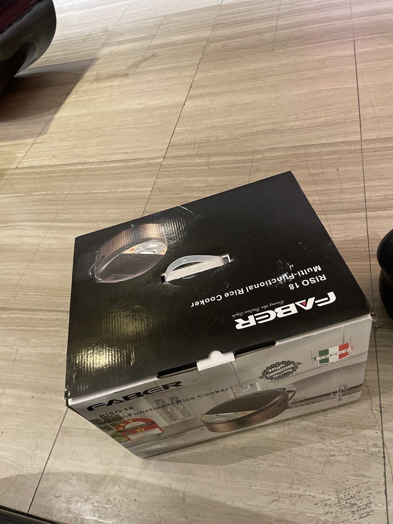 FABER RISO 18 Multi-Functional Rice Cooker (Category: Cookers) located in Kuala Lumpur. Submitted by keenphoenix_d27e89 (Listing ID 1446693419, Image 1). Description: - FABER RISO 18 Rice Cooker - Multi-functional: Cook rice and other dishes - Original box included - Easy to use controls - Great for everyday cooking.