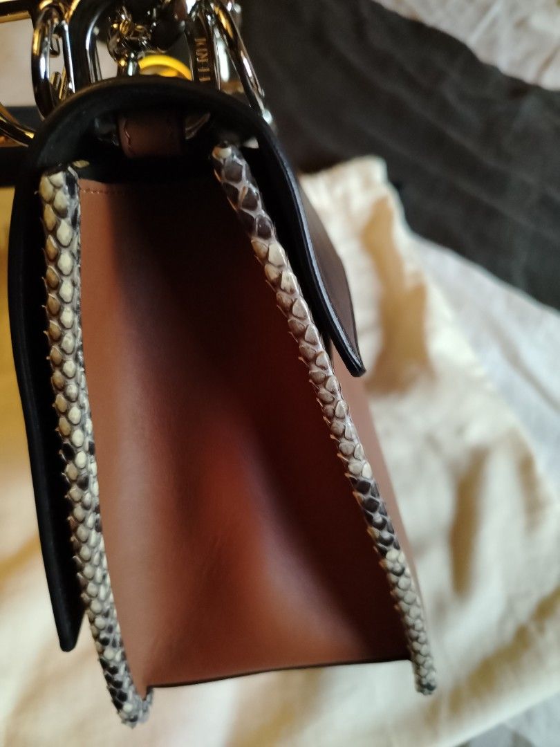 Fendi (Category: Luxury Bags & Wallets) located in Manila. Submitted by kcfunkyfindz (Listing ID 1446593559, Image 3). Description: Authentic Fendi Snakeskin Kan I Logo Limited Edition Complete inclusions with 2 straps *nego for sure buyers only.