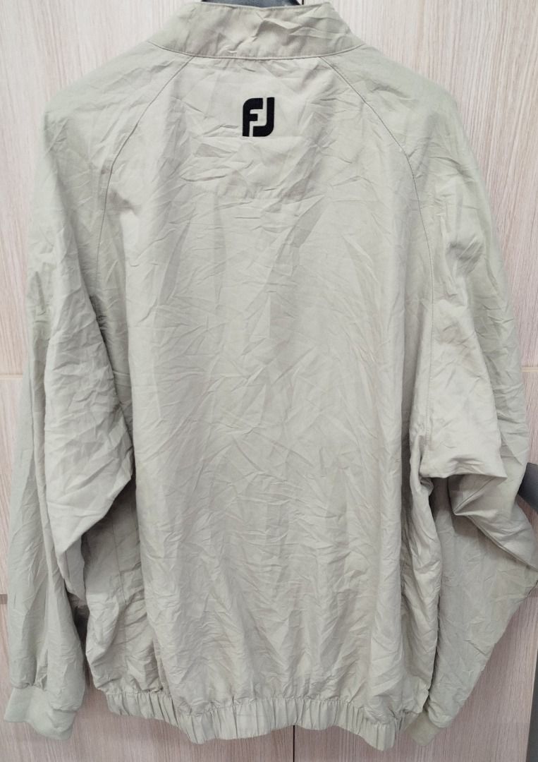 Footjoy FJ Golf Pullover Fore Parkinson's (Category: Golf) located in Caloocan City. Submitted by safebear_4bdc70 (Listing ID 1446635855, Image 2). Description: Lightweight Footjoy pullover. Beige color. Features the FJ logo and 'Fore Parkinson's' embroidery on the chest. Also has a small embroidered logo on the left sleeve. Snap button closure at the neck. Great for layering on the golf course.Size L..
