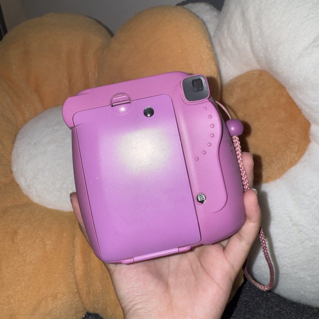 Fujifilm Instax Mini 8 Purple Instant Camera (Category: Cameras) located in Paranaque City. Submitted by c.c_preloved (Listing ID 1446646168, Image 2). Description: Dont know if still working FOR SALE AS IS - Fujifilm Instax Mini 8 Camera - Color: Purple - Includes: Wrist strap.