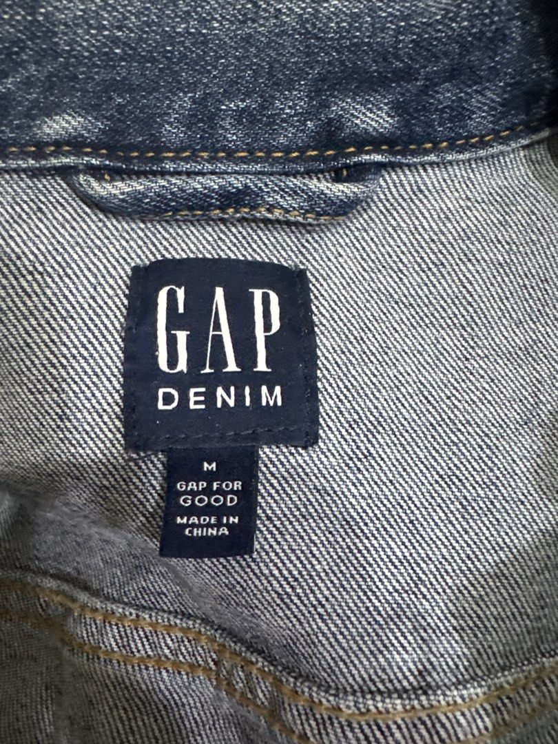 GAP Denim Jacket - Blue - Size M (Category: Coats, Jackets and Outerwear) located in Binan City. Submitted by mituz (Listing ID 1446545142, Image 2). Description: - Classic blue denim jacket from GAP - Size: Medium (M) - Button front closure - Two chest pockets with button flaps - Side pockets - A great staple piece for any wardrobe - Easy to style up or down.