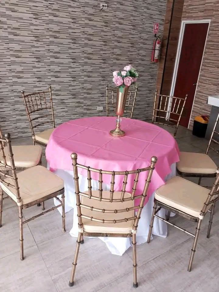 Gold Chiavari Chairs and Round Tables for Events (Category: Tables & Sets) located in Manila. Submitted by mysticwind_fe8195 (Listing ID 1446652586, Image 2). Description: - Elegant gold Chiavari chairs with comfortable beige cushions. - Round tables available. - Ideal for weddings, parties, and corporate events. - Chairs are stackable for convenient storage. - Removable cushions for easy cleaning. - Available for rent or purchase. - Contact us f