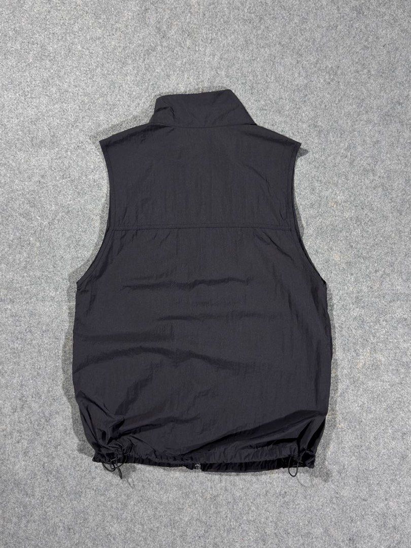 GU Woven Utility Cargo Vest (Category: Vests) located in Zamboanga. Submitted by zhifay (Listing ID 1446712351, Image 2). Description: GU Woven Utility Cargo Vest Color: Solid Black Size: Small (Fits Small to Medium) Measurements: Pit to Pit: 20inches Length: 26inches Excellent Condition Features 4-pocket configuration, full-zip closure, standing wind collar, and an adjustable cinchable drawcord hem. Lightweight 100% recycled nylon matte finish. 