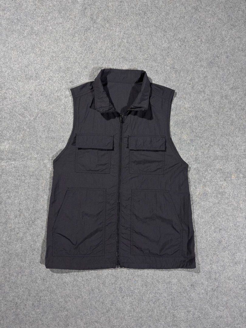 GU Woven Utility Cargo Vest (Category: Vests) located in Zamboanga. Submitted by zhifay (Listing ID 1446712351, Image 1). Description: GU Woven Utility Cargo Vest Color: Solid Black Size: Small (Fits Small to Medium) Measurements: Pit to Pit: 20inches Length: 26inches Excellent Condition Features 4-pocket configuration, full-zip closure, standing wind collar, and an adjustable cinchable drawcord hem. Lightweight 100% recycled nylon matte finish. 