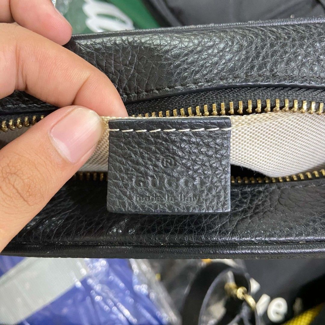 Gucci Black Leather Soho Disco Camera Bag (Category: Luxury Bags & Wallets) located in Bacolod City. Submitted by capitalismgoods6100 (Listing ID 1446577180, Image 2). Description: - Authentic Black Leather Gucci Soho Disco Bag - Iconic Interlocking G Logo - Secure Zip Closure - Adjustable Shoulder Strap for Comfort - Interior Tag: Model 308364 2018 - Additional Tag: 36915 - Made in Italy.