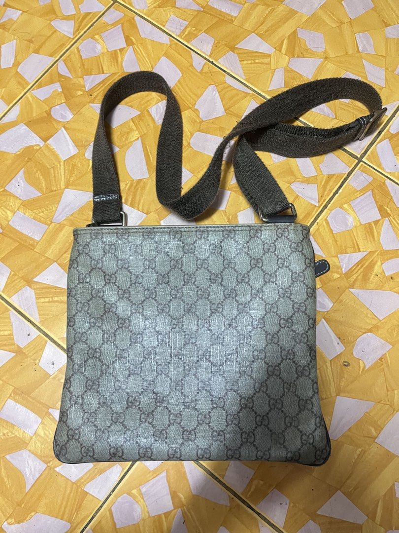 Gucci GG Messenger Sling Bag (Category: Luxury Bags & Wallets) located in Bacolod City. Submitted by eman_03 (Listing ID 1446658068, Image 2). Description: Excellent Condition Adjustable Sling Minimal Sign of Usage (Scratch) Working Zipper.