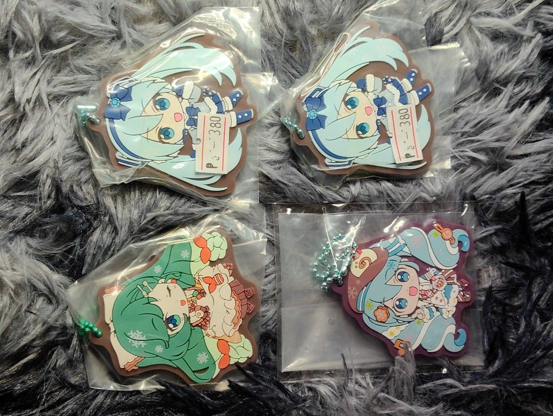 Hatsune Miku Snow Miku rubber Keychain (Category: Character Goods) located in Pasig City. Submitted by hazelscollectibles (Listing ID 1446592567, Image 1). Description: - Adorable Snow Miku 2020 keychain charms 285 each - Available in 4 cute designs - Each charm is individually packaged - Ideal for Hatsune Miku fans - Perfect for decorating bags or keys.