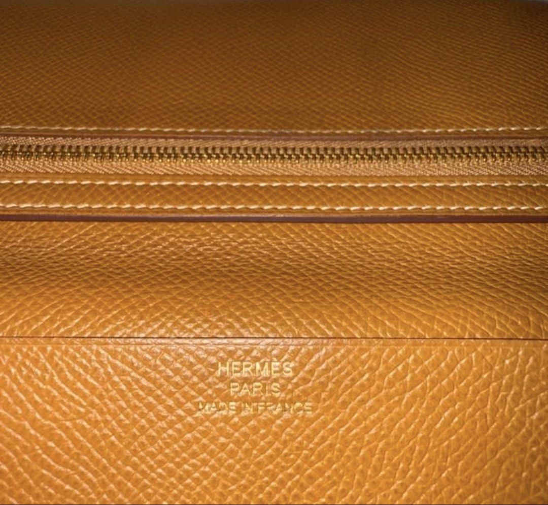 Hermes Bearn Wallet (gold on gold) (Category: Luxury Bags & Wallets) located in Cavite. Submitted by okaypreloved (Listing ID 1446611618, Image 1). Description: •TARNISHED HARDWARE •BROKEN STITCHINGS •WORN OUT COLOR •STRAP ALREADY FLIMSY (DIFFICULT TO TUCK BACK IN)(SOFT ALREADY) bought here in carousel as well but never used https://www.hermes.com/pt/en/product/bearn-wallet-H084871CC37/ ALL SALES ARE FINAL AND NONRETURNABLE.