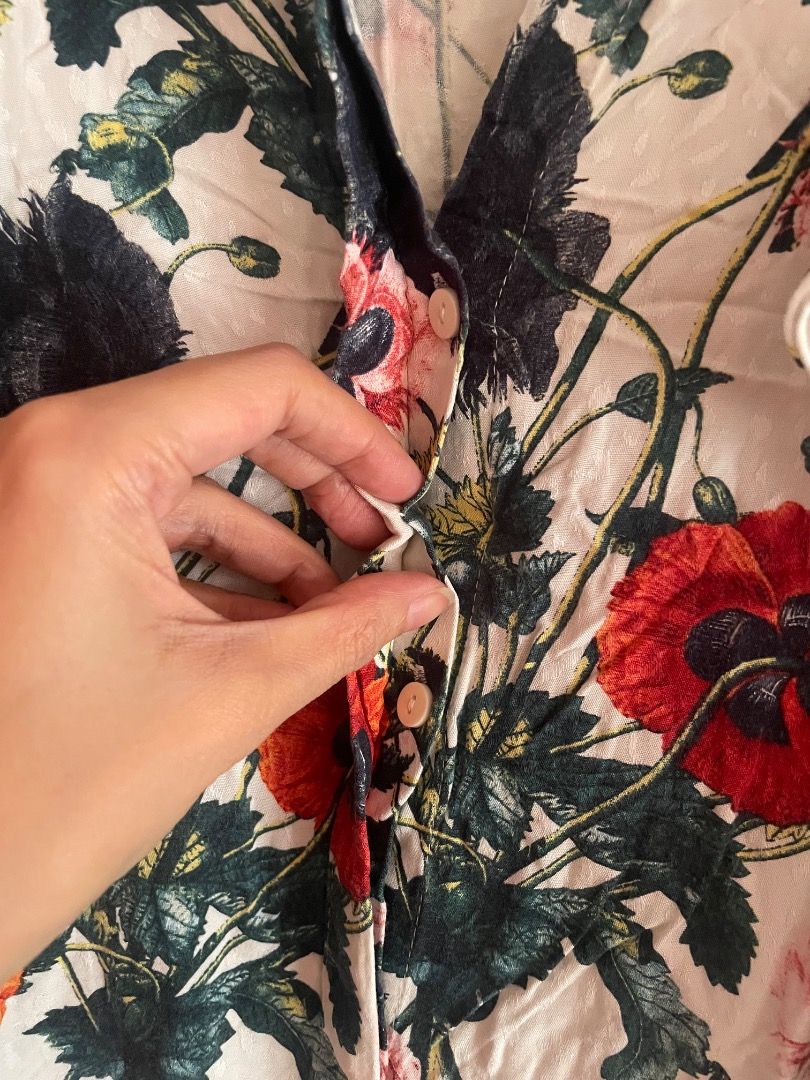 H&M Floral Maxi Dress with Button Front (Category: Dresses) located in Paranaque City. Submitted by cngaya (Listing ID 1446627785, Image 3). Description: - Cream maxi dress - Bold red, navy and green floral print - Short flutter sleeves - Button-down front - Subtle textured fabric pattern - Perfect for casual outings or summer events - Size: EUR 34 - Please do not send me lowball offers, I would appreciate it if respect would be given to the list