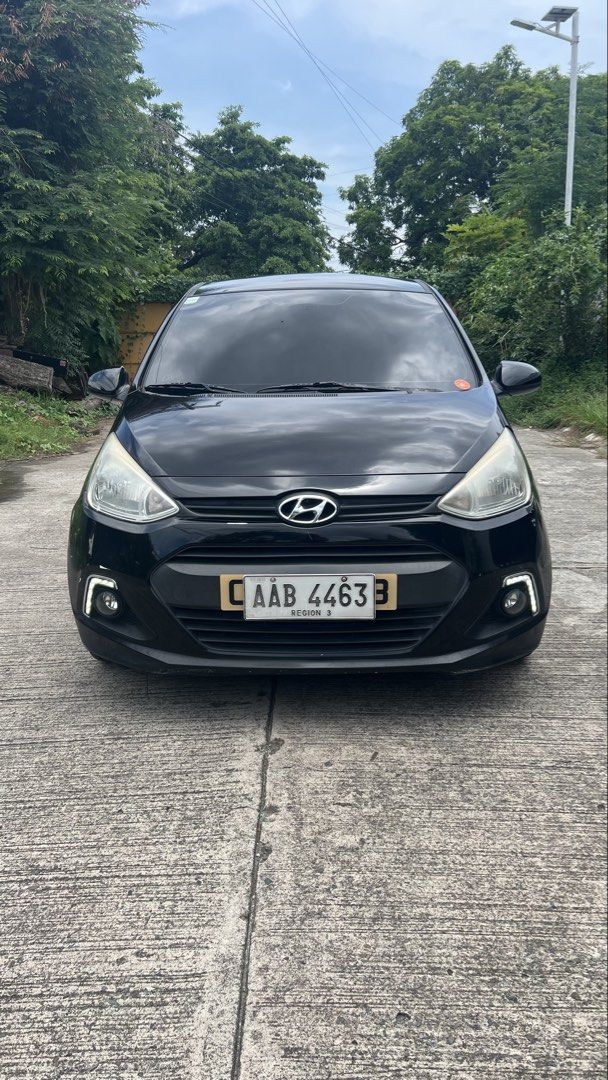 Hyundai Grand i10 I10 Auto (Category: Used Cars) located in Makati City. Submitted by iambosspatrick (Listing ID 1440155351, Image 1). Description: 2014 Hyundai Grand I10 150,000++++ kms First Owner Complete Papers under my name Updated Registration Cold Aircon Led Projector Headlight Led Fog lights with DRL Led Tail lights Led Reverse lights Led Signal Lights 3M Super Black tint 2 Original Remote Key Power Adjust side mirror Phantom Black Androi