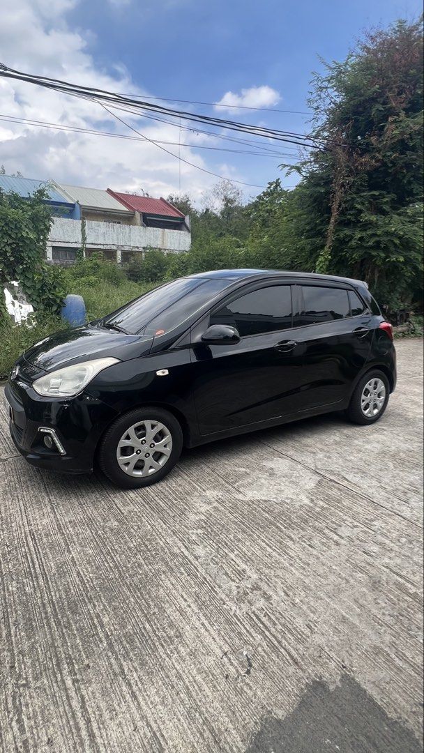 Hyundai Grand i10 I10 Auto (Category: Used Cars) located in Makati City. Submitted by iambosspatrick (Listing ID 1440155351, Image 2). Description: 2014 Hyundai Grand I10 150,000++++ kms First Owner Complete Papers under my name Updated Registration Cold Aircon Led Projector Headlight Led Fog lights with DRL Led Tail lights Led Reverse lights Led Signal Lights 3M Super Black tint 2 Original Remote Key Power Adjust side mirror Phantom Black Androi