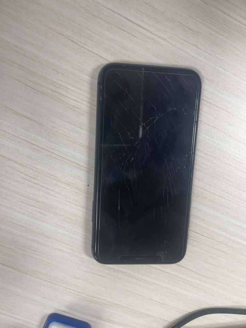 Iphone 11 (Category: iPhone 11 Series) located in Manila. Submitted by romel.pagkalinawan (Listing ID 1446635394, Image 1). Description: Iphone 11 128 GB capacity Globelocked 82% BH Never been opened or repaired Issues Cracked screen front and back Body Scratches All function and buttons working.