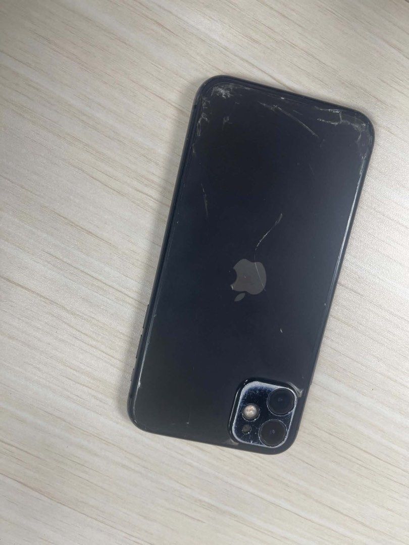 Iphone 11 (Category: iPhone 11 Series) located in Manila. Submitted by romel.pagkalinawan (Listing ID 1446635394, Image 2). Description: Iphone 11 128 GB capacity Globelocked 82% BH Never been opened or repaired Issues Cracked screen front and back Body Scratches All function and buttons working.