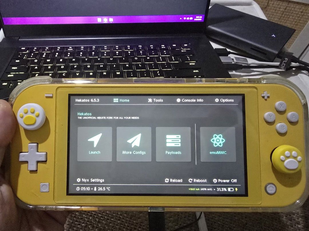 Nintendo Switch Lite (Jailbroken) (Category: Nintendo) located in Taguig. Submitted by cuberootg (Listing ID 1441766240, Image 2). Description: Bought this in UAE. barely used it and just jailbroken recently. shell and buttons like new condition. - Jail broken already with games(TOTK,BOTW,etc) - Includes Skull & Co. case - Screen protector already on - All buttons fully functional and crisp like new - TMR joysticks(no stick drift) - No issues and
