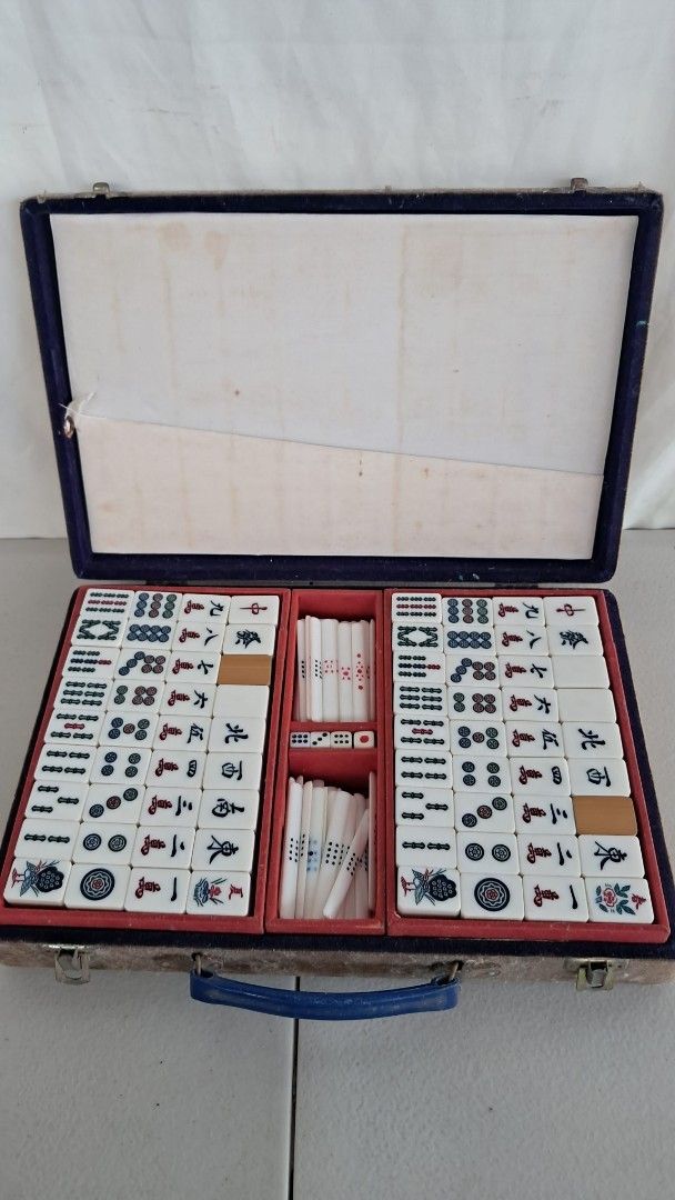 Japan Vintage MINI Mahjong Set with Case (Category: Board Games & Puzzles) located in Bulacan. Submitted by amarijapansurplus (Listing ID 1446637624, Image 2). Description: - Complete Mahjong set - Comes in a blue carrying case with handle - Includes mahjong tiles, dice, and racks - Tiles feature traditional Chinese characters and imagery - Ideal for game nights or as a decorative item - Portable and ready for its next owner 📌as is 📌What u see 