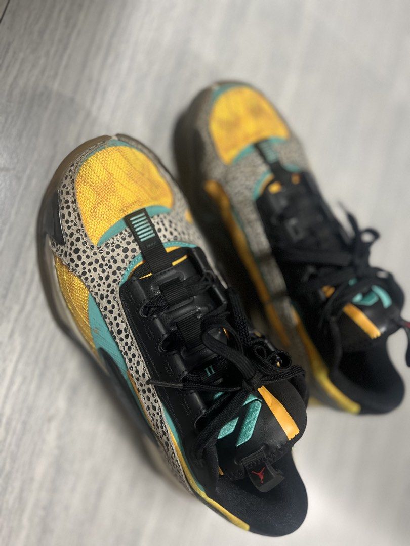 Jordan 36 SE "Guo Ailun" Size 9 (Category: Sneakers) located in Manila. Submitted by camzcastro70875 (Listing ID 1446635347, Image 1). Description: Jordan 36 SE Guo Ailun edition. Size US 9, UK 8, EUR 42.5. Yellow and black colorway with cheetah print accents. Great for basketball or casual wear. Some signs of wear on the soles and uppers. Check photos for details..
