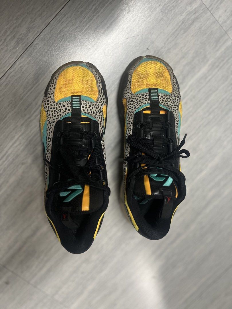 Jordan 36 SE "Guo Ailun" Size 9 (Category: Sneakers) located in Manila. Submitted by camzcastro70875 (Listing ID 1446635347, Image 2). Description: Jordan 36 SE Guo Ailun edition. Size US 9, UK 8, EUR 42.5. Yellow and black colorway with cheetah print accents. Great for basketball or casual wear. Some signs of wear on the soles and uppers. Check photos for details..
