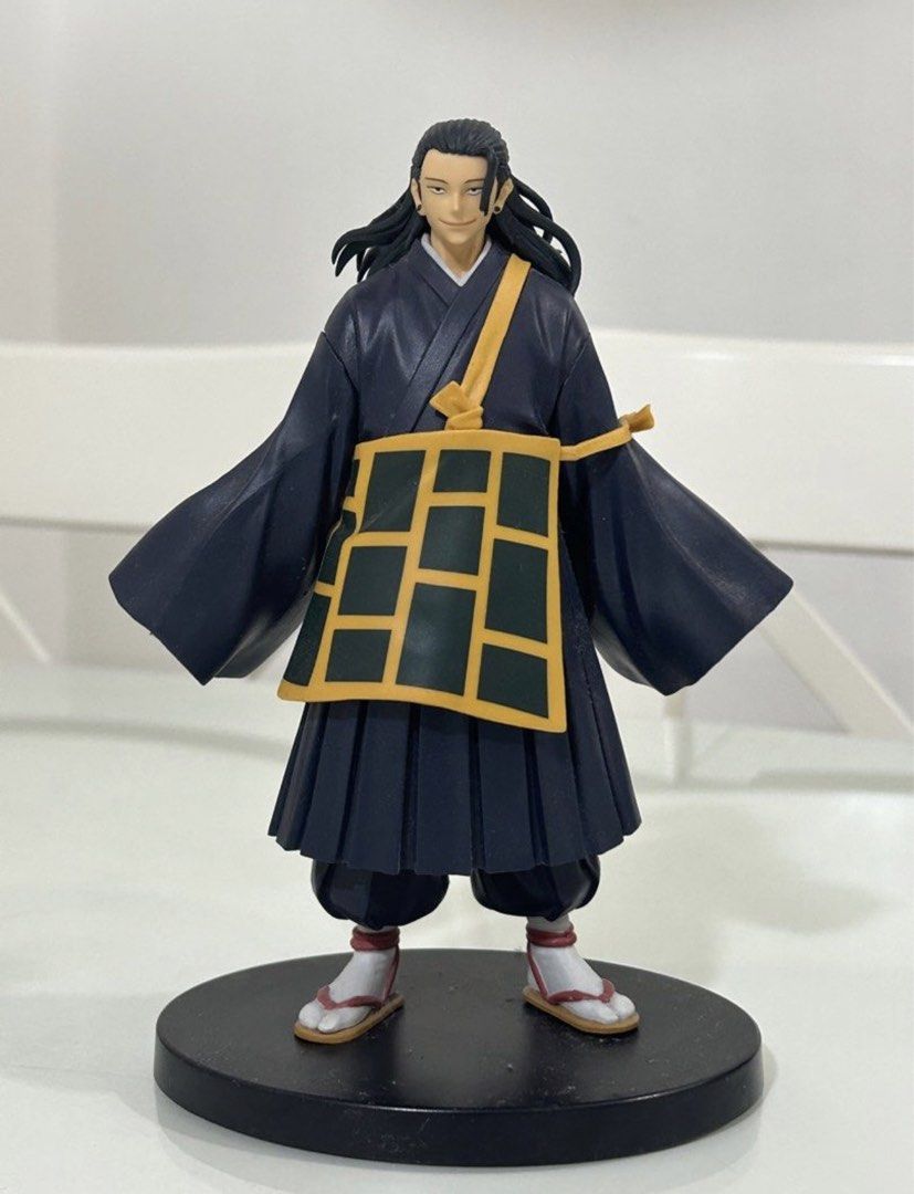 Jujutsu Kaisen Suguru Geto Figure (Category: Figurines & Statues) located in Pasig City. Submitted by watchmens (Listing ID 1446649672, Image 1). Description: - Jujutsu Kaisen Suguru Geto Figure - Dressed in iconic dark blue robes with yellow and green accent pouch - Stands on a sturdy black circular base - Ideal collectible for fans of the series.