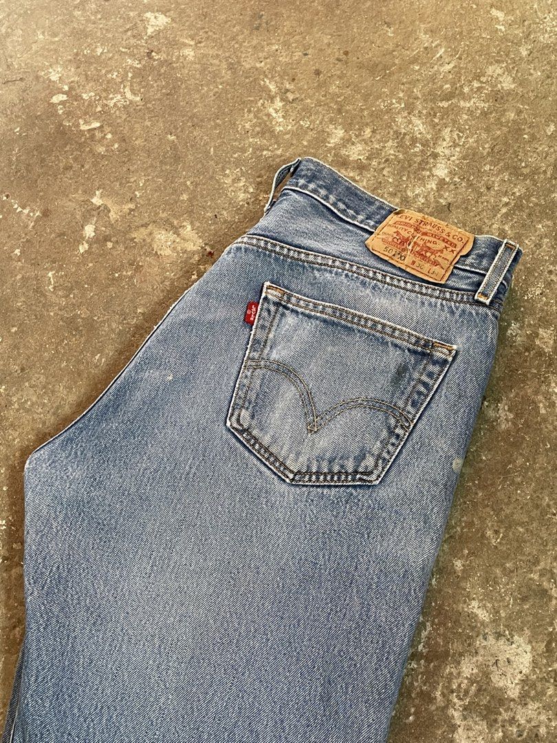 Levi's 501 Jeans 36x34 Light Wash (Category: Jeans) located in Angono. Submitted by semgabrielle13 (Listing ID 1446649816, Image 2). Description: - Classic Vintage Levi's 501 jeans - Light wash denim - Button fly closure - Size: 36 waist, 34 inseam - Unique paint splatters on legs for a worn-in look - Perfect for casual wear or work - Length is 41.5 - Leg hole is 8.5 Issue is paint splatter minor scratch honestly looks like a design not bothering