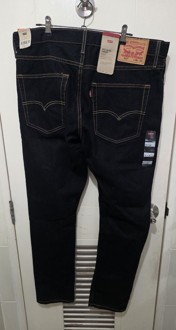 Levi's 512 Slim Taper Jeans (Category: Jeans) located in Manila. Submitted by sound.solution (Listing ID 1446546164, Image 2). Description: - Brand New Levi's 512 Slim Taper Jeans - Color: Dark Wash Denim - Size: 36 Waist, 32 Length - Fit: Sits below the waist, slim through the thigh with a taper - Condition: Brand new with tags authentic and original.