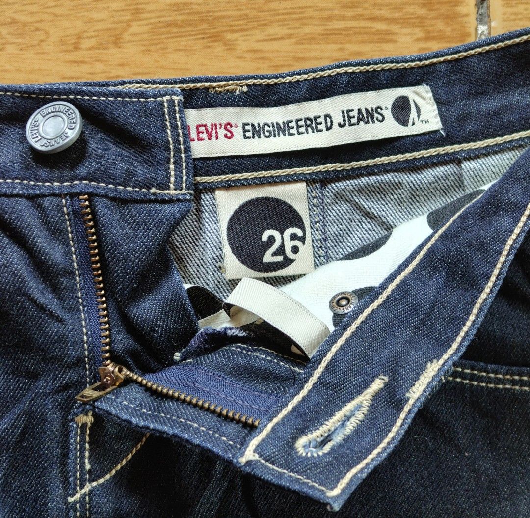 Levi's Engineered Jeans Denim Skirt Size 26 (Category: Skirts) located in Kabankalan. Submitted by stylesavy (Listing ID 1446661347, Image 3). Description: - Levi's Engineered Jeans Denim Skirt - Size: 26 (fits waist 26-28 inches) - Length: 18 inches - Color: Dark wash denim with white stitching - Features: Classic five-pocket styling, button and zip fly - Style: Great for casual wear.