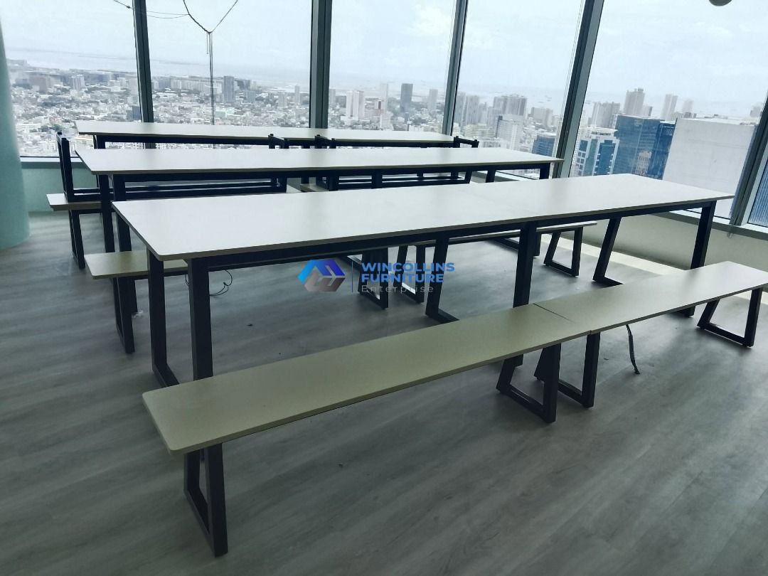 Long Office/Dining Table with Benches (Category: Tables & Sets) located in Caloocan City. Submitted by jeraldhine_09 (Listing ID 1446548772, Image 2). Description: - Modern long tables with matching benches - Ideal for office break rooms or large dining areas - Features sturdy metal legs and a light wood top - Offers ample seating space - Multiple units available - Contact us for more details.