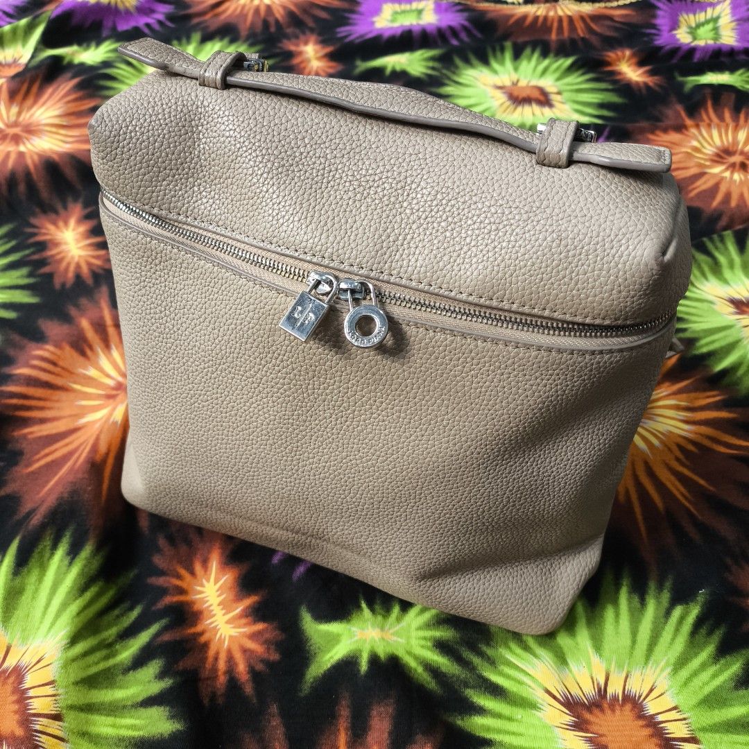 Loro Piana Extra Pocket L23.5 Leather 2 Way (Category: Luxury Bags & Wallets) located in Quezon City. Submitted by jedclo (Listing ID 1446557713, Image 1). Description: In pristine condition Color due lightning MOP: GCASH, DM to purchase Disclaimer: "All brand names, logos, and images are registered trademarks of their respective owners. No affiliation or copyright infringement intended.
