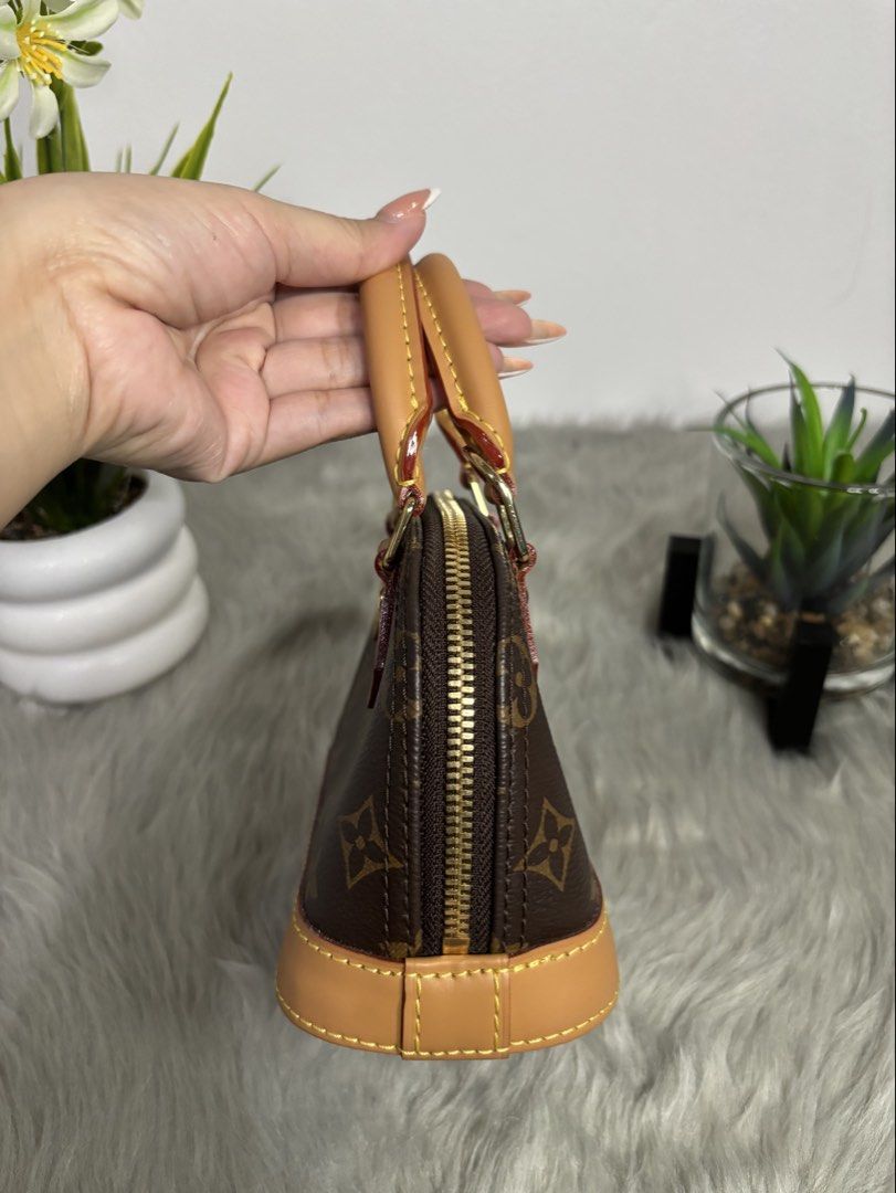 LOUIS VUITTON ALMA MINI BAG (Category: Luxury Bags & Wallets) located in Manila. Submitted by Bagstatic_luxuries (Listing ID 1442967278, Image 3). Description: RARE TO FIND!!! MUST GRAB THIS!!! 😍😍😍 With original dustbag Japan sourced 🇯🇵.