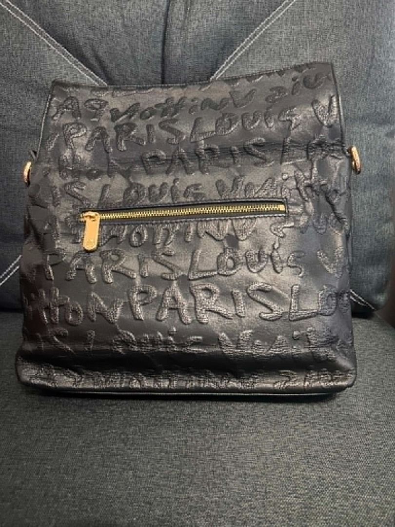 Louis Vuitton Black Leather Embossed Shoulder Bag (Category: Luxury Bags & Wallets) located in Paranaque City. Submitted by swiftarrow2026 (Listing ID 1446628441, Image 3). Description: - Vintage LV Paris Embossed - All-over embossed Louis Vuitton Paris lettering - Lining in very good condition - Hard ware with minor scratches .