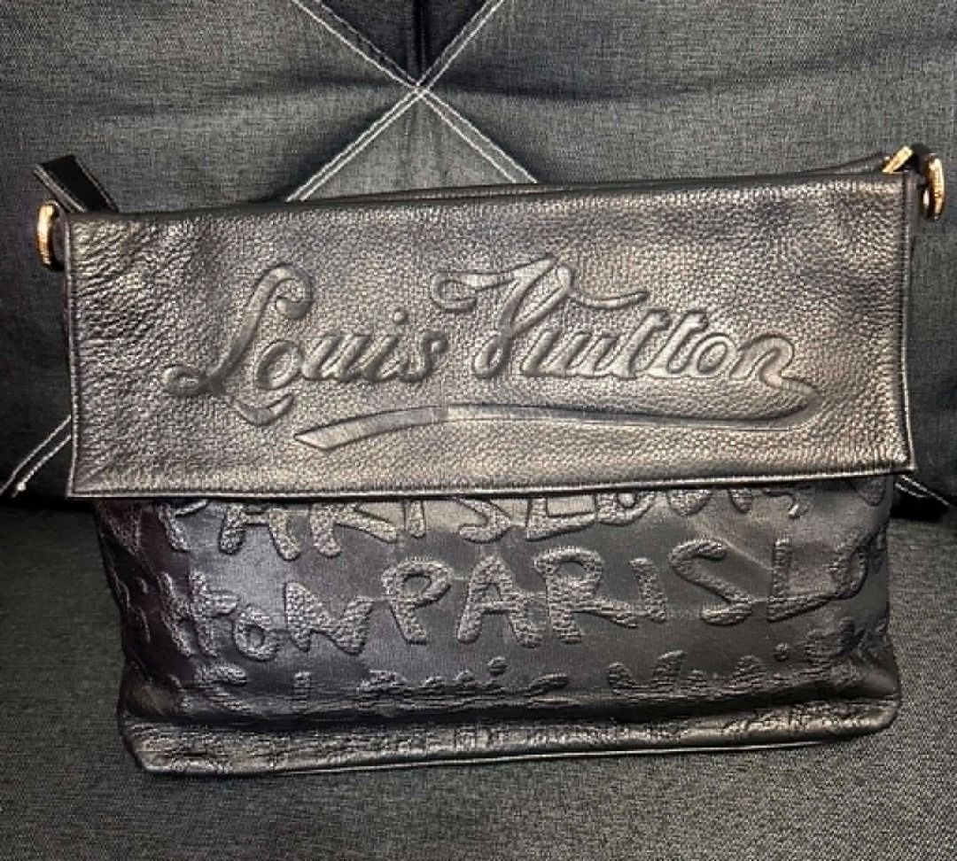 Louis Vuitton Black Leather Embossed Shoulder Bag (Category: Luxury Bags & Wallets) located in Paranaque City. Submitted by swiftarrow2026 (Listing ID 1446628441, Image 2). Description: - Vintage LV Paris Embossed - All-over embossed Louis Vuitton Paris lettering - Lining in very good condition - Hard ware with minor scratches .