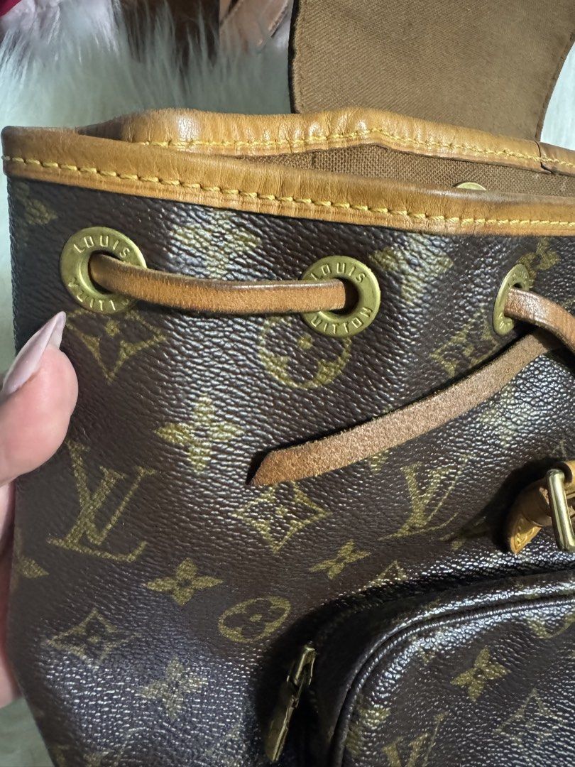 Louis Vuitton Monogram Canvas Backpack (Category: Luxury Bags & Wallets) located in Quezon City. Submitted by jbspreloved (Listing ID 1446664306, Image 3). Description: - Classic Louis Vuitton monogram backpack -Montsouris BB -no cracks -slight watermarks - comes with dustbag .
