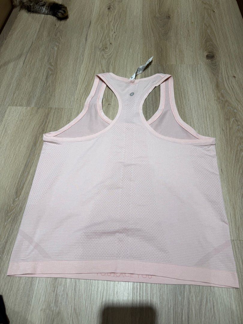Lululemon Pink Racerback Tank Top Size 8 (Category: Activewear) located in San Juan City. Submitted by lamawears (Listing ID 1446698802, Image 3). Description: Authentic Lululemon Tank Top - baby pink - size 8 - used once, as good as new.