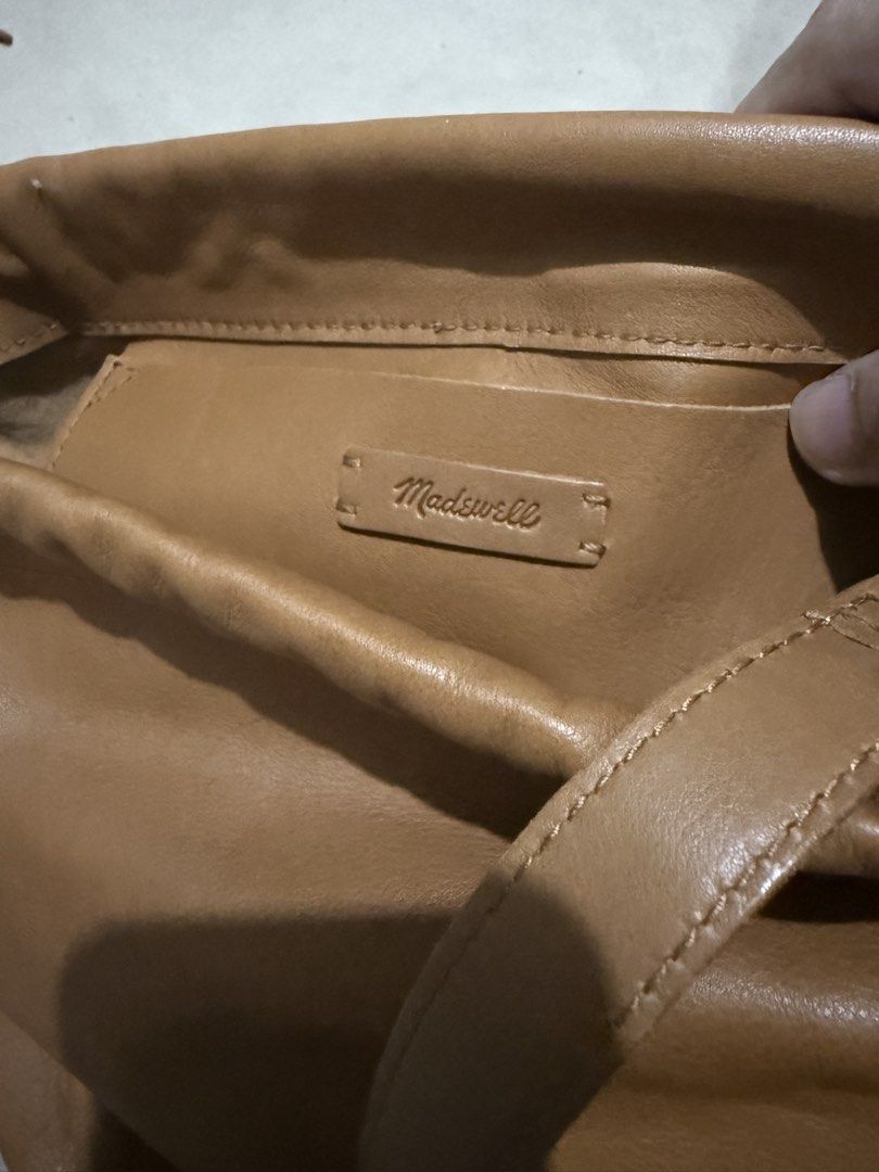 Madewell Leather Drawstring Bucket Bag Tan (Category: Cross-body Bags) located in Quezon City. Submitted by jong_17 (Listing ID 1446649153, Image 3). Description: -Magnetic closure. -Interior pocket. -22” crossbody drop. 9 1/2”H x 9”W x 3”D. -tan color -bought it for 8k in the US -good as new - no dust bag .