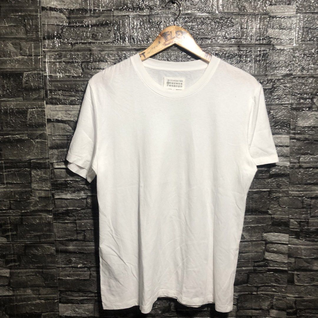 Maison Margiela Plain Shirt (Category: Luxury Apparel) located in Manila. Submitted by flex_curation (Listing ID 1446675870, Image 1). Description: 20x27 IN VERY GOOD CONDITION AND IN PRESENTABLE CONDITION BACOOR CAVITE LOC.