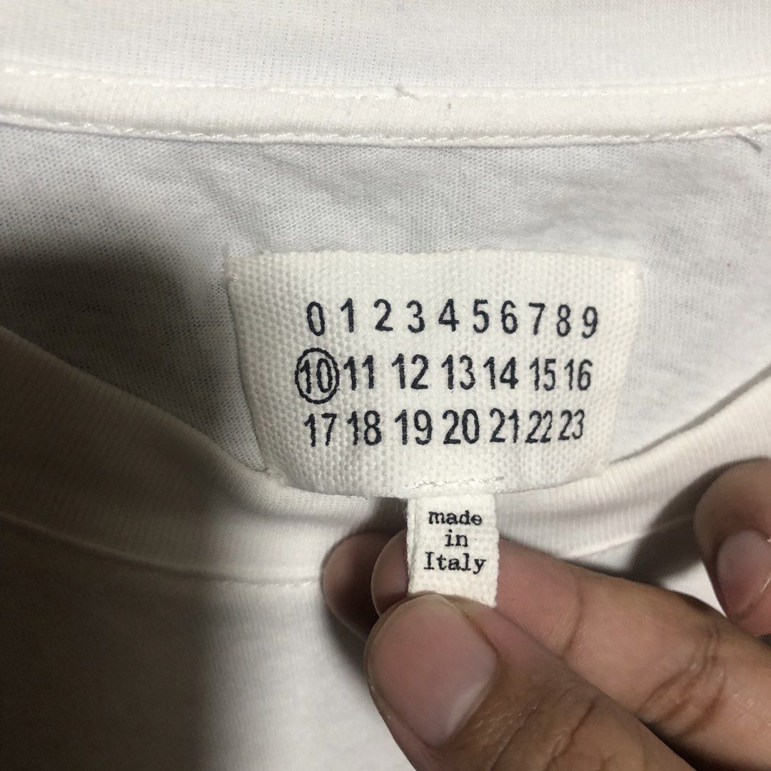 Maison Margiela Plain Shirt (Category: Luxury Apparel) located in Manila. Submitted by flex_curation (Listing ID 1446675870, Image 3). Description: 20x27 IN VERY GOOD CONDITION AND IN PRESENTABLE CONDITION BACOOR CAVITE LOC.