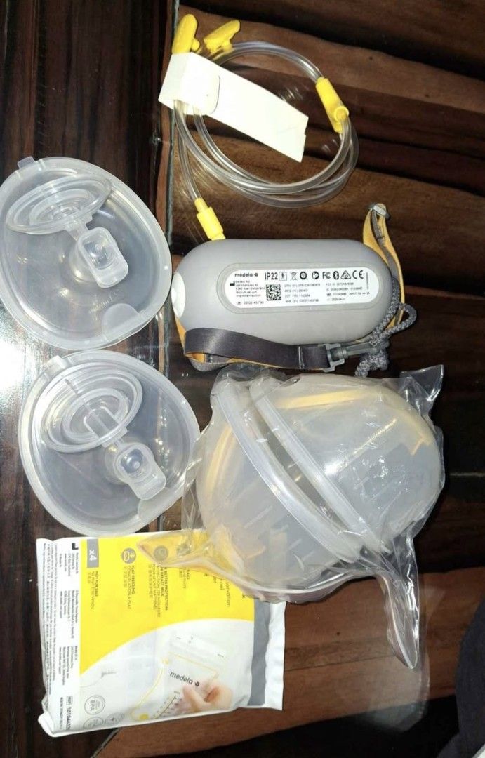 Medela Freestyle Double Electric Breast Pump (Category: Breastfeeding & Bottle Feeding) located in Cavite. Submitted by 92939494959597 (Listing ID 1446590117, Image 3). Description: - Medela Freestyle double electric breast pump - Hands-free design for ultimate comfort - Lightweight and portable, perfect for on-the-go - Includes pump, tubing, and breast shields - Easy-to-clean parts for convenience -feel free to dm me -negotiable.