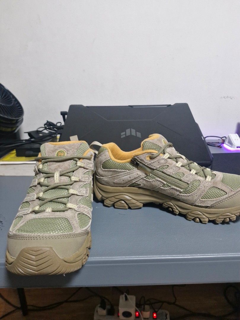 Merrell Moab 3 (Category: Boots) located in Quezon City. Submitted by glhd2019121616 (Listing ID 1446577349, Image 2). Description: - Merrell Moab 3 ready zip - Color: Tan and Olive Green - Vibram soles for excellent grip -waterproof -Size 9 US men -Brandnew without box -fitted only Rfs: Wrong size.