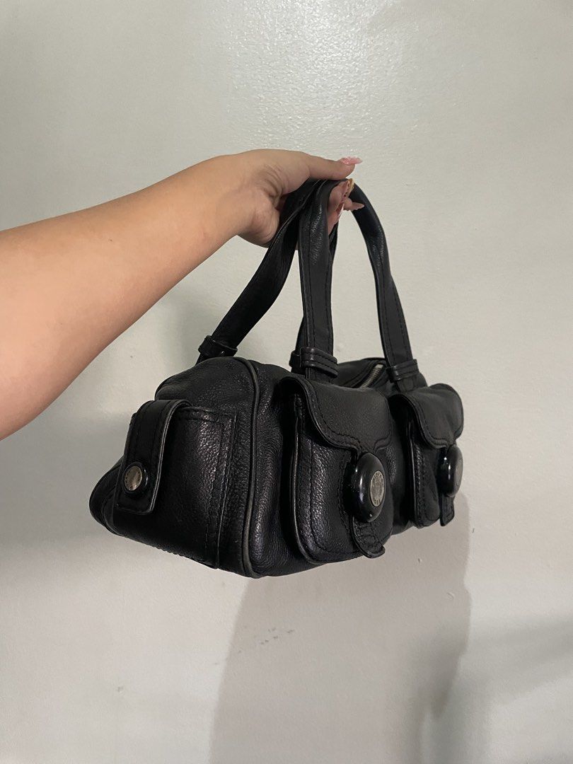 Michael Kors Handbag (Category: Luxury Bags & Wallets) located in Manila. Submitted by declutteredbyalex (Listing ID 1446655335, Image 2). Description: PRODUCT NAME: Michael Kors womens handbag | Double pocket black leather baguette whistlet purse ❗️ LAST PRICE IS ALREADY POSTED • Authentic / Original Michael Kors • PURE LEATHER • Excellent condition - no damages or flaws • Features 2 front pockets for easy organization • Top handle and zip closu