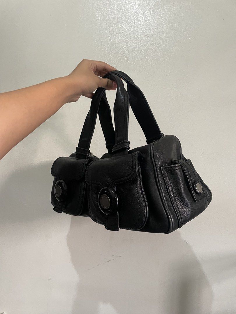 Michael Kors Handbag (Category: Luxury Bags & Wallets) located in Manila. Submitted by declutteredbyalex (Listing ID 1446655335, Image 3). Description: PRODUCT NAME: Michael Kors womens handbag | Double pocket black leather baguette whistlet purse ❗️ LAST PRICE IS ALREADY POSTED • Authentic / Original Michael Kors • PURE LEATHER • Excellent condition - no damages or flaws • Features 2 front pockets for easy organization • Top handle and zip closu