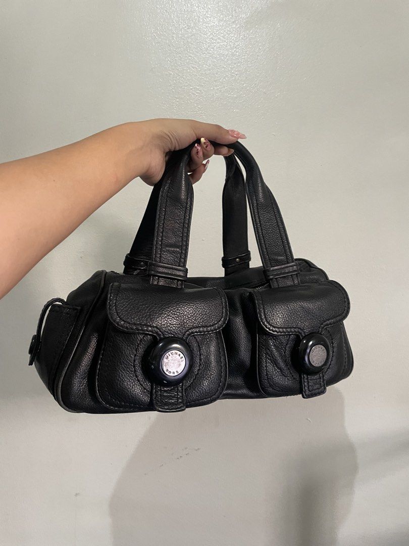 Michael Kors Handbag (Category: Luxury Bags & Wallets) located in Manila. Submitted by declutteredbyalex (Listing ID 1446655335, Image 1). Description: PRODUCT NAME: Michael Kors womens handbag | Double pocket black leather baguette whistlet purse ❗️ LAST PRICE IS ALREADY POSTED • Authentic / Original Michael Kors • PURE LEATHER • Excellent condition - no damages or flaws • Features 2 front pockets for easy organization • Top handle and zip closu