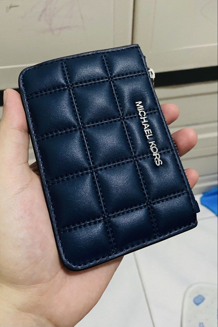 Michael Kors Jet Set Coin Pouch (Category: Luxury Bags & Wallets) located in Santa Rosa. Submitted by kevinparayan14 (Listing ID 1446603904, Image 1). Description: - Selling my Micheal Kors Jet Set Coin Pouch - Good as New - Slightly Negotiable.