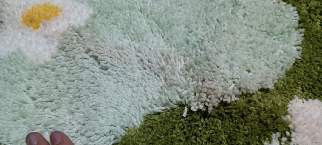 Mossy Grass Fluffy Carpet (Category: Carpets, Mats & Flooring) located in Quezon City. Submitted by piptea (Listing ID 1446632478, Image 3). Description: - round fluffy soft rug, really heavy when rolled up - grass and flower patterns - theres a small tear on the underside but otherwise fine - fibers dont fall out that much - needs cleaning - negotiable RFS: bought this from the orange app but seller gave me the wrong variant, i thought i'd stick