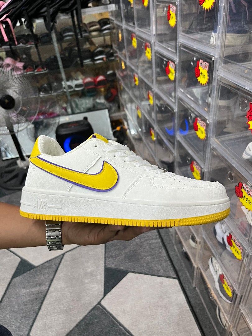Nike Air Force 1 White Yellow Swoosh (Category: Sneakers) located in Manila. Submitted by navi1000 (Listing ID 1446651177, Image 1). Description: - Classic white Nike Air Force 1s - Features a bright yellow swoosh and sole - Clean, versatile design that goes with everything - Great for everyday wear - Iconic and must-have kicks.