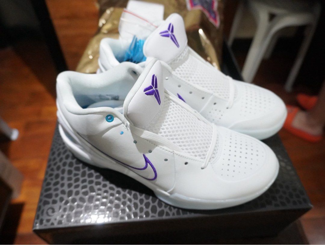 Nike Kobe 4 Protro White Court Draft Pack Hornets (Category: Sneakers) located in Taguig. Submitted by sc2303 (Listing ID 1446613448, Image 3). Description: - Nike Kobe 4 Protro sneakers - Color: White and Purple - Size: 8 US Men's - Includes original box - Includes original receipt from Titan - Ideal for basketball and casual wear.