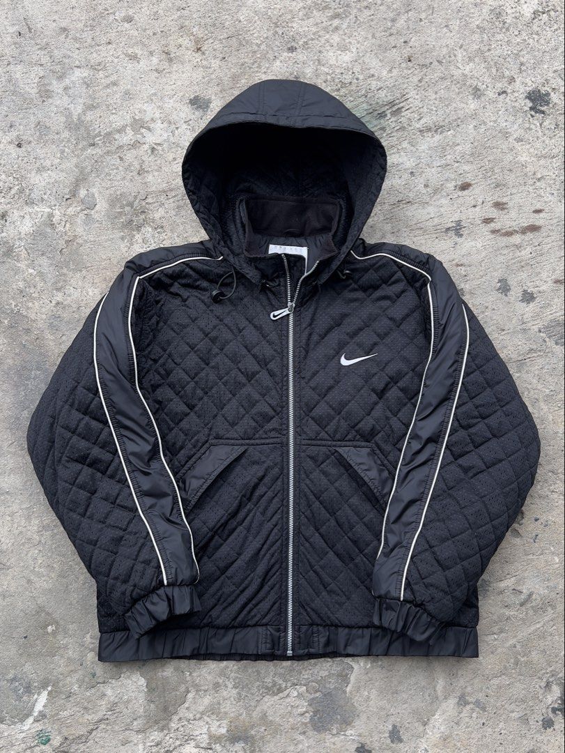Nike Quilted Hooded Jacket Black Swoosh (Category: Coats, Jackets and Outerwear) located in Manila. Submitted by dopehits (Listing ID 1446647052, Image 2). Description: Size Large Boxy fit 25x26.5 Detachable Hoodie 📩📩📩.