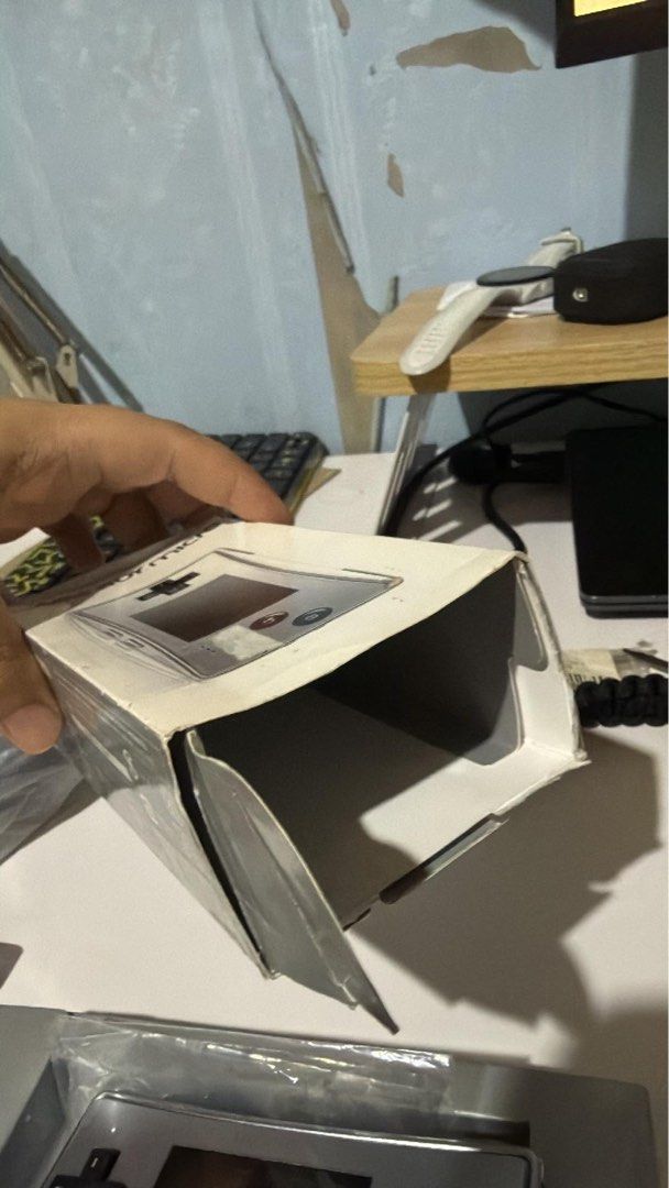 Nintendo Gameboy Micro Silver (Category: Nintendo) located in Manila. Submitted by retrohere.gb (Listing ID 1446702901, Image 2). Description: Gameboy Micro Silver Console Condition 11/10 Box Condition: 4/10 Price: 15,000 php Fix Location: Bacoor Cavite Mop: Bpi/Gcash Shipping: Lalamove or LBC.