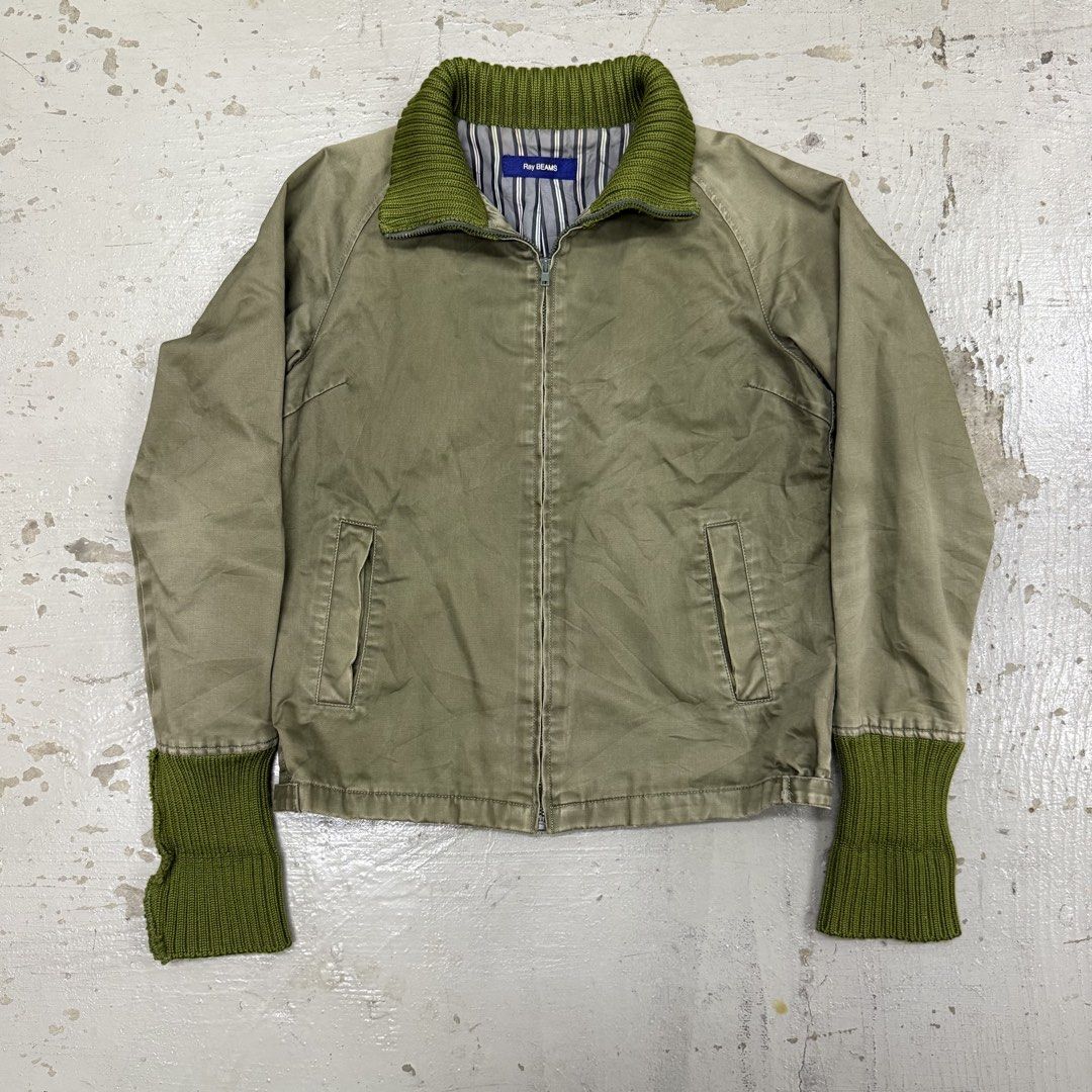 Olive Green Zip-Up Jacket with Green Ribbed Collar and Cuffs (Category: Coats, Jackets and Outerwear) located in Kuala Lumpur. Submitted by prelovedgbk (Listing ID 1446704242, Image 2). Description: - Olive green jacket - High ribbed collar and matching ribbed cuffs in vibrant green - Zip-up front closure - Two side pockets - Ideal for layering - Measurements: Approx. 15" chest, 22" length.