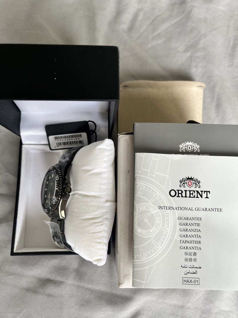 Orient Automatic Watch (Category: Men's Watches) located in Mandaluyong City. Submitted by dreishain (Listing ID 1446572827, Image 3). Description: - Orient Ray Raven II FAA02003B9 -automatic watch black PVD metal - Includes original box - Comes with international guarantee booklet and manual - unused metal bracelet -intact hang tag RFS: Downsizing collection .